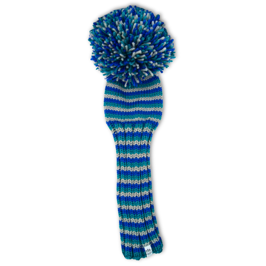 Blue and white striped golf club head cover with a pom-pom on a white background