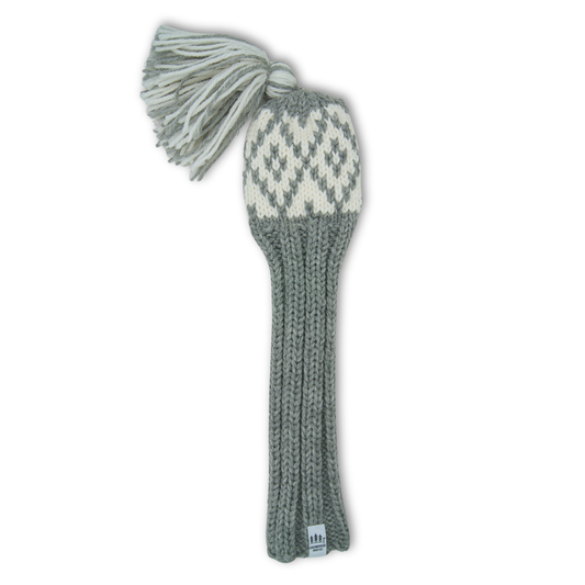 Knitted golf club head cover with a patterned top and plain bottom on a white background