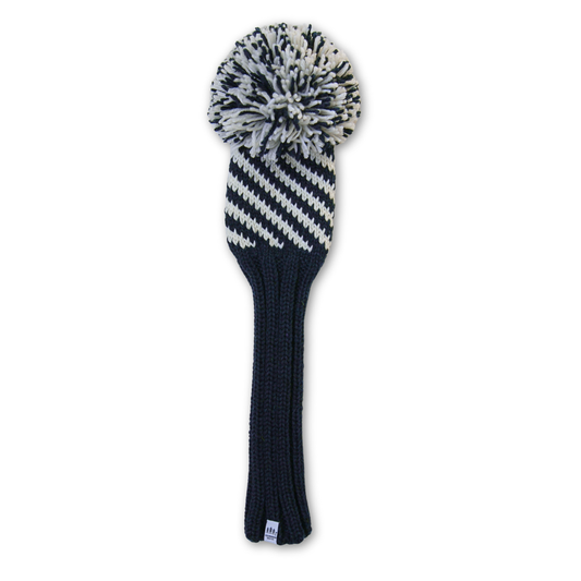 Golf club head cover with navy and white spiral pattern on a white background